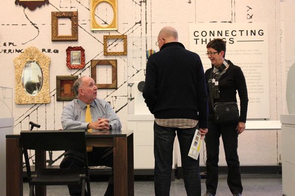 Arnold Lehman at the Connecting Cultures Desk